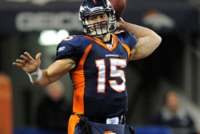Tony Dungy thinks the Eagles should at least take a look at Tim Tebow. (Jack Dempsey/AP file photo)