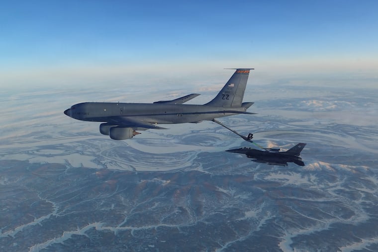 This photo provided by the U.S. Department of Defense shows a North American Aerospace Defense Command F-16 fighter refueling from a KC-135 Stratotanker over western Alaska on Thursday, Feb. 19, 2026.