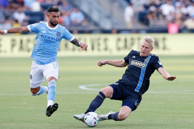 Jakob Glesnes (right) won Major League Soccer's Defender of the Year award.