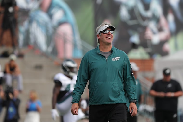 EaglesÕ head coach Doug Pederson watches during the Philadelphia Eagles training camp at the NovaCare complex in Philadelphia, PA on July 31, 2018. DAVID MAIALETTI / Staff Photographer