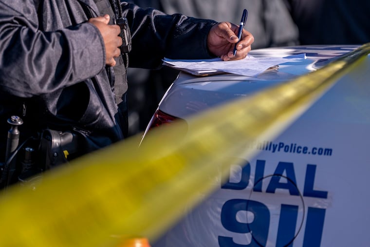 Philadelphia police investigate a shooting.