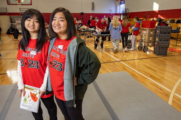 Twin sisters Michele (left) and Jess Sun, at blood drive they helped organize at Penncrest High School in Media, PA on Thursday, February 2, 2023. According to the sister they will take blood from approximately 100 donors.