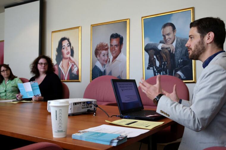 Peter Katona, who is an actor, leads a seminar about the Affordable Care Act at The Actors Fund, as attendees actor and writer Judy Heneghan, left, and actor Teresa Hegji, second from left, listen in, March 17, 2014, in Los Angeles. The Actors Fund holds these weekly seminars to teach people about Obamacare, since many actors are self-employed. (Katie Falkenberg/Los Angeles Times/MCT)