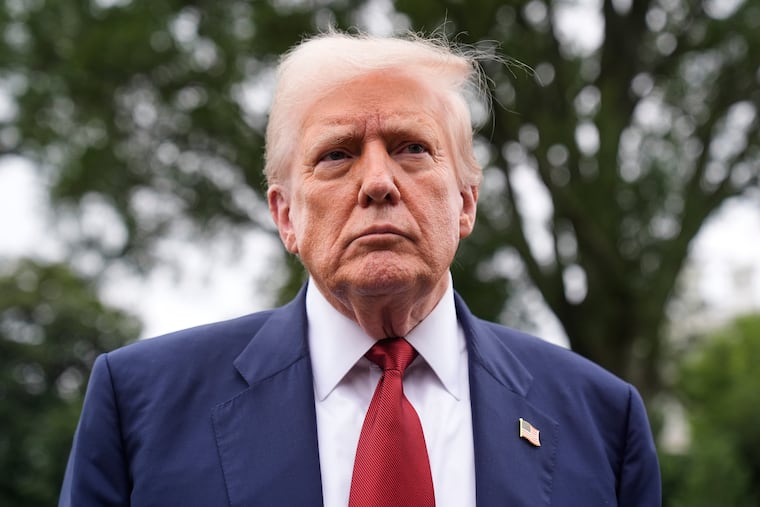 President Donald Trump talks to reporters on the South Lawn of the White House before he boards Marine One en route to Joint Base Andrews, Md. on Aug. 1, 2025.