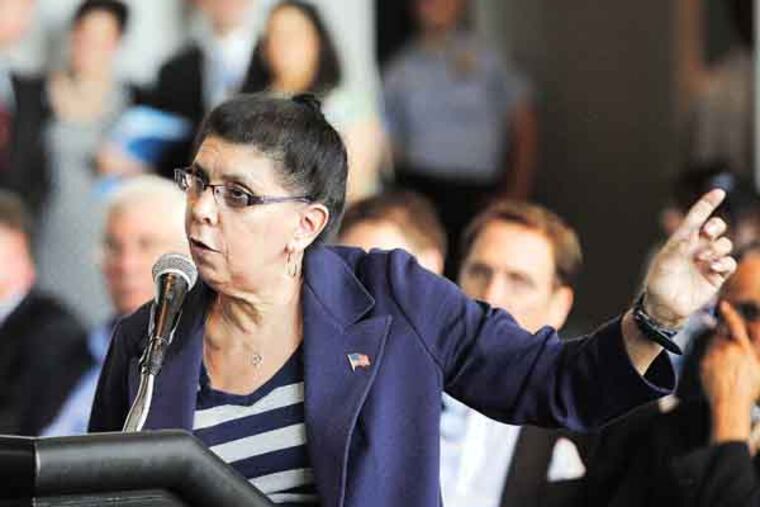 During casino hearings held at Lincoln Financial Field, Judy Cerrone, president of the Stadium Community Council, tells the Pennsylvania Gaming Control Board that her group opposes any casino south of Oregon Avenue. ( MICHAEL S. WIRTZ / STAFF PHOTOGRAPHER ). May 8, 2013.