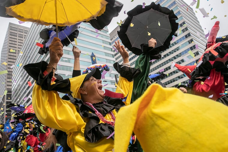 Members of the Oregon Wench Brigade perform at the 2022 Mummers Parade in Philadelphia on Sunday, Jan. 2, 2022.