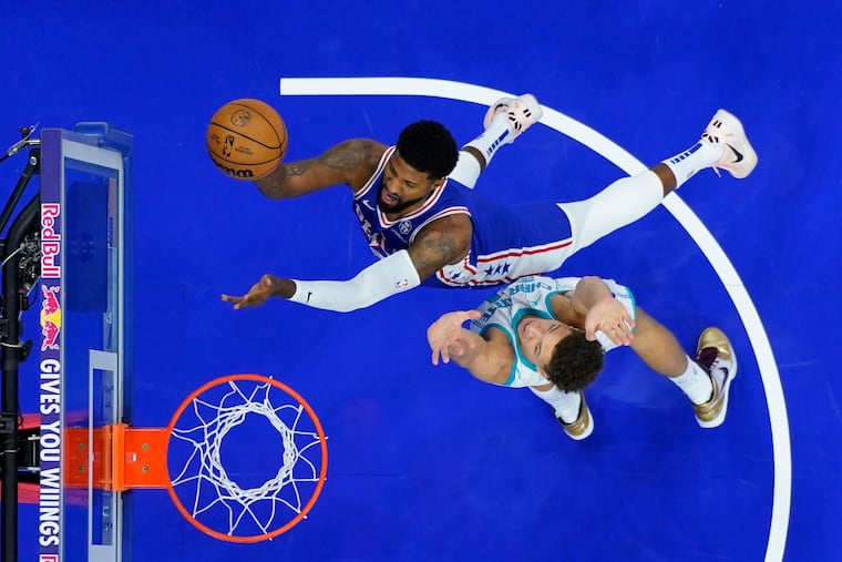 The Sixers' Paul George didn't play in overtime on Sunday because of his minutes restriction.