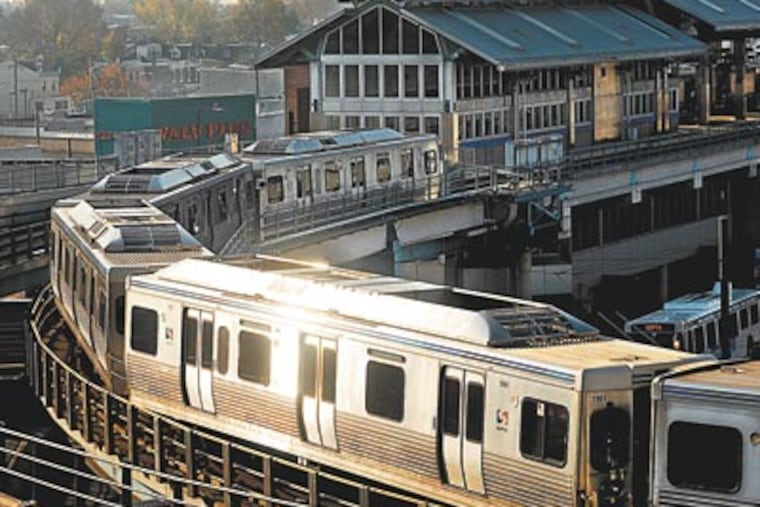 A Market-Frankford El train leaves the Frankford Transportation Center. (Tom Gralish / Staff Photographer)