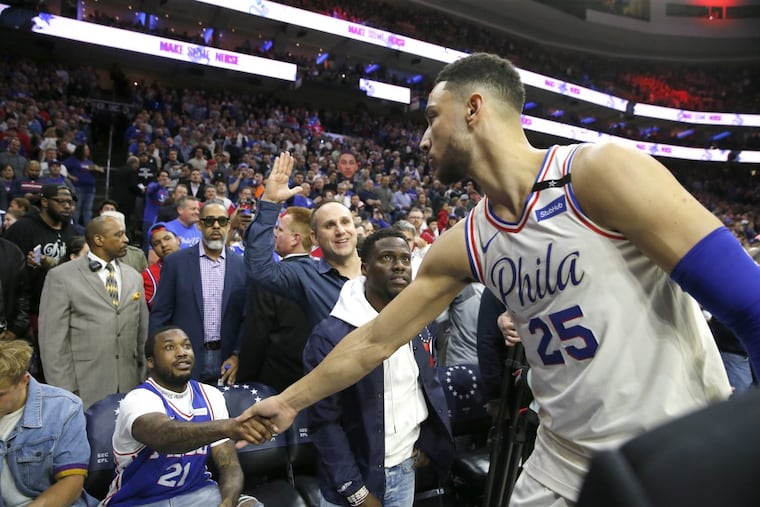 Ben Simmons fielded a few questions about Meek Mill (left) before asking reporters to focus on the game, just like he was.