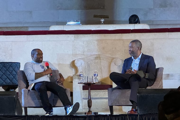 Marc Lamont Hill (left) interviews essayist, author, and journalist Ta-Nehisi Coates about his new memoir, "The Message," at the chapel of Girard College.