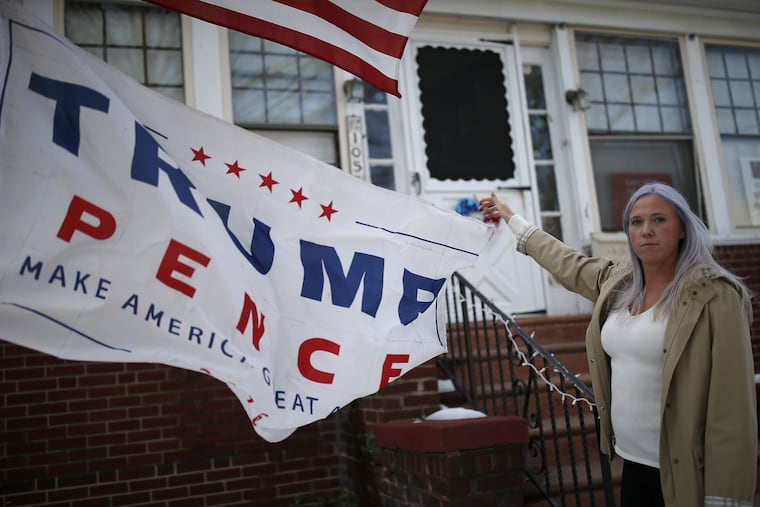 Lauren Boisvert has decorated the outside of her house in Collingswood, NJ in Trump paraphernalia, drawing abuse from some in the community. She also has a tattoo of Trump's signature on her left foot.