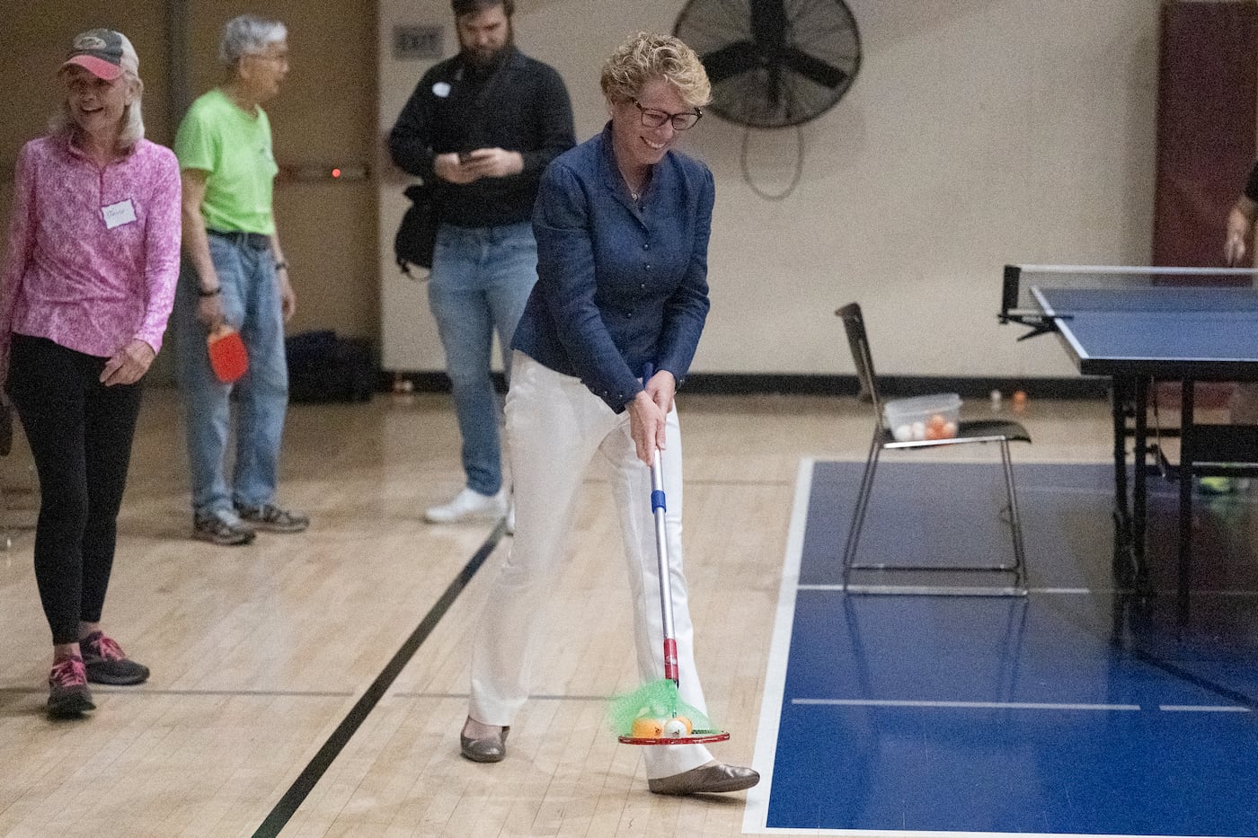U.S. Rep. Chrissy Houlahan (D. Pa.) visits with senior citizens at the YMCA in West Chester. She shares the burden of the “sandwich generation” caring for her elderly parents, opening her home to her adult daughter and son-in-law, and helping to care for her other daughter’s toddler.