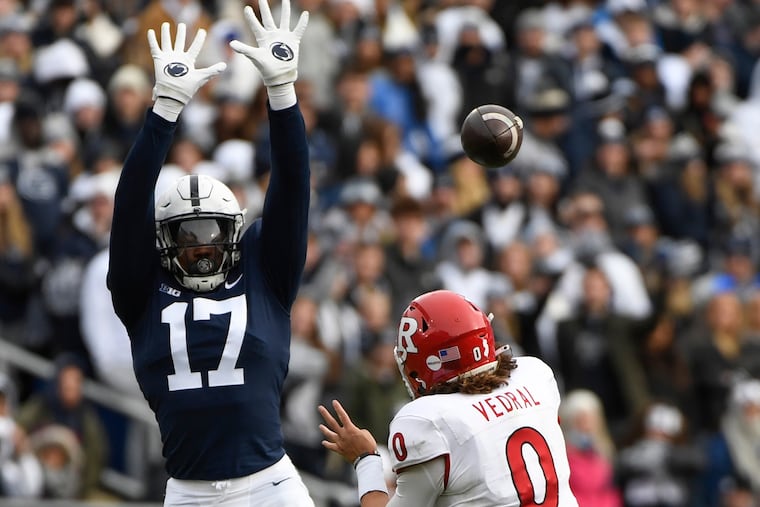 Penn State defensive end Arnold Ebiketie pressures Rutgers quarterback Noah Vedral on Nov. 20.