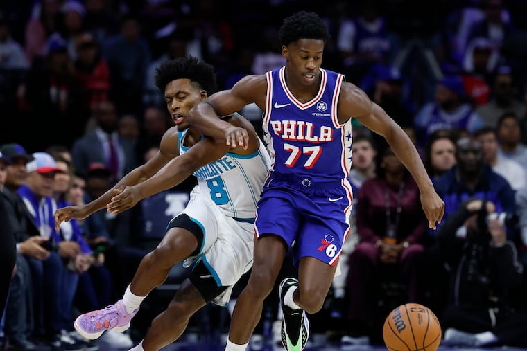 VJ Edgecombe steals the basketball against Charlotte Hornets guard Collin Sexton in the first quarter of Saturday's Sixers home opener.