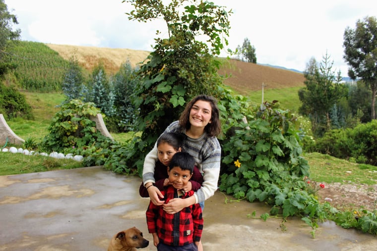 Anna Sophie Tinneny with two members of the family she is living with on a farm in Ecuador during a gap year.