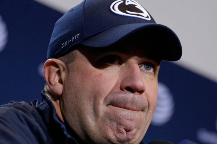 Penn State head coach Bill O' Brien listens to a question during his post-game press conference after a 23-20 loss to Nebraska in overtime of an NCAA college football game in State College, Pa., Saturday, Nov. 23, 2013. (Gene J. Puskar/AP)