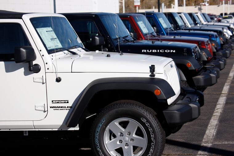FILE- In this Nov. 1, 2009, file photo unsold 2010 Wranglers sit at a Chrysler/Jeep dealership in Englewood, Colo. Fiat Chrysler is recalling more than 1.6 million vehicles worldwide to replace Takata front passenger air bag inflators that can be dangerous. The recall covers the 2010 through 2016 Jeep Wrangler SUV, the 2010 Ram 3500 pickup and 4500/5500 Chassis Cab trucks, the 2010 and 2011 Dodge Dakota pickup, the 2010 through 2014 Dodge Challenger muscle car, the 2011 through 2015 Dodge Charger sedan, and the 2010 through 2015 Chrysler 300 sedan. (AP Photo/David Zalubowski, File)