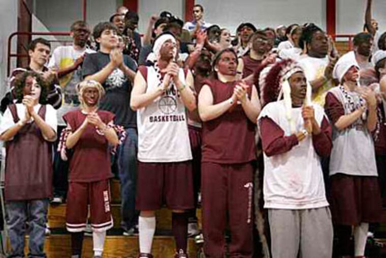 Fans cheer on Wildwood High last year during South Jersey Group 1 Girls' BB Championship. The city's mayor thinks closing the school could help reduce taxes. ( Eric Mencher / Staff Photographer )