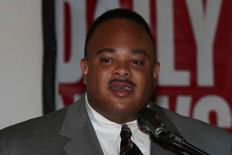 STEVEN M. FALK / STAFF PHOTOGRAPHER George Holcombe , 42, was fired from the force in November after he was arrested following a custody dispute with his ex-girlfriend.