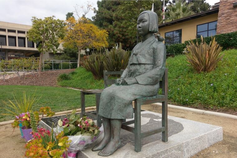 Here is an image of the statue honoring Korean "comfort women." Advocates are seeking to place the memorial around the world. This photograph shows the statue in Glendale, Calif.