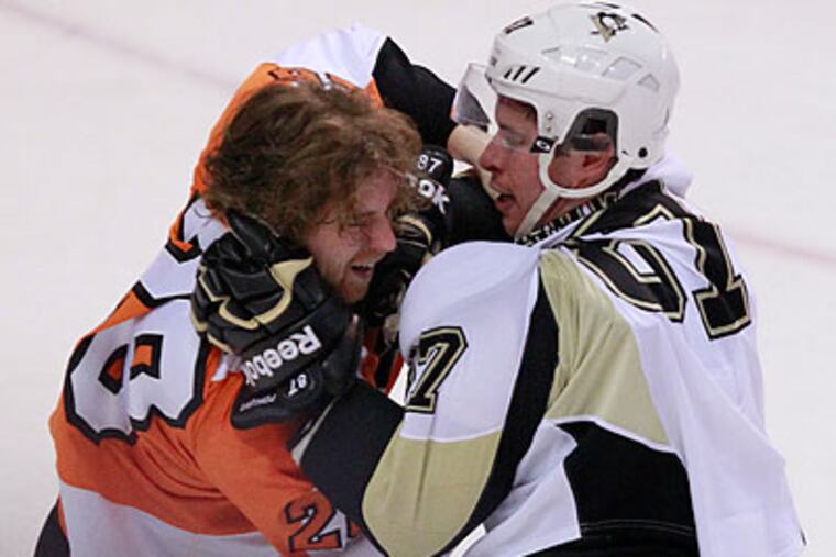 Claude Giroux and Sidney Crosby both have histories of suffering concussions. (Ron Cortes/Staff Photographer)