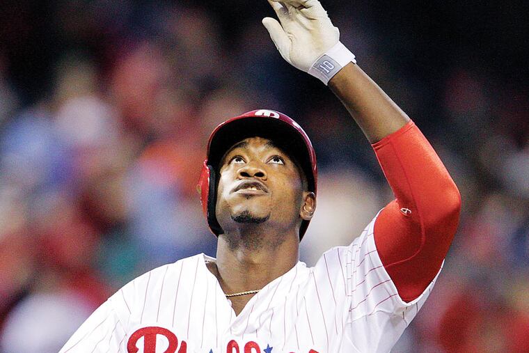 Phillies' left fielder Domonic Brown (9) looks up to the sky as he crosses home plate after hitting a solo homer against the Marlins during the 4th inning at Citizens Bank Park in Philadelphia, Friday, May 3, 2013. ( Steven M. Falk / Staff Photographer )