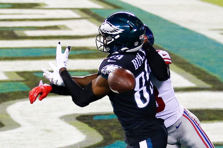 Eagles tight end Hakeem Butler fails to catch the ball in the end zone against Giants cornerback Logan Ryan.