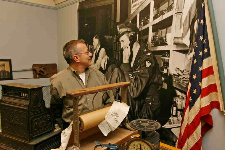 Timothy Harley, executive director of the Jimmy Stewart Museum, at a display of items from the Stewart family store in 2008.