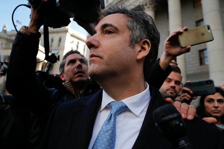 Michael Cohen walks out of federal court, Thursday, Nov. 29, 2018, in New York, after pleading guilty to lying to Congress about work he did on an aborted project to build a Trump Tower in Russia. Cohen, President Donald Trumps former lawyer, told the judge he lied about the timing of the negotiations and other details to be consistent with Trump's "political message." (AP Photo/Julie Jacobson)