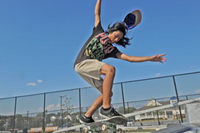 Skateboarder Jay Tran, an unofficial ambassador at Stockton Station Park in East Camden, his neighborhood. (April Saul / Staff Photographer)
