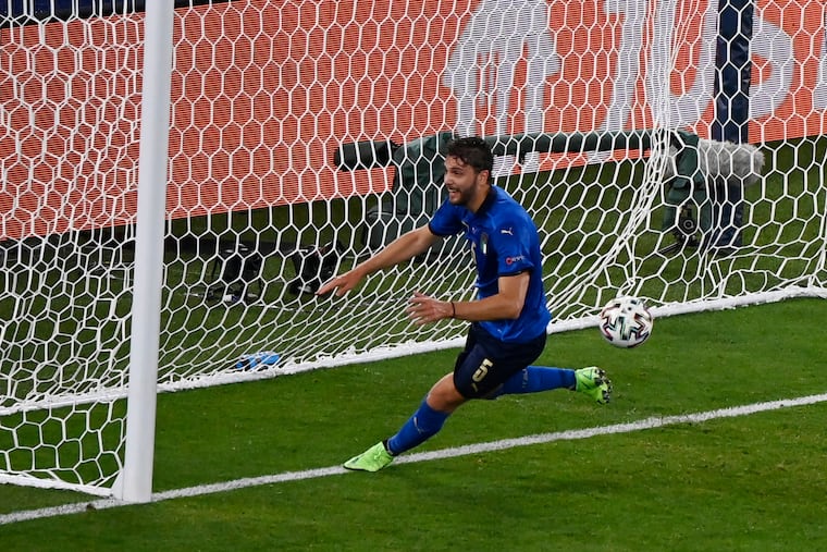 Italy's Manuel Locatelli celebrates after scoring his team's opening goal against Switzerland on Wednesday.