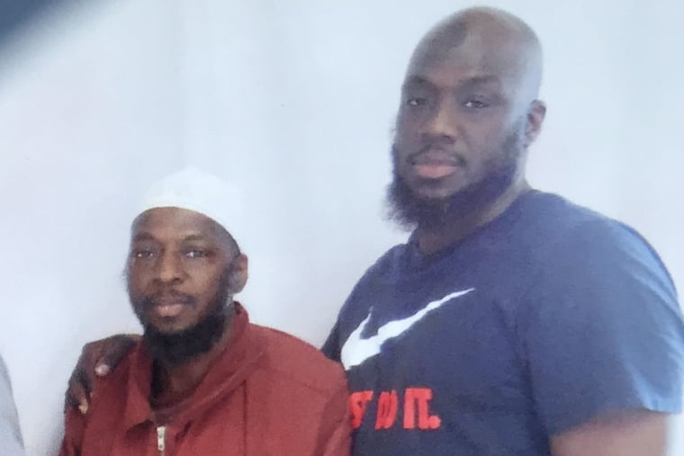 Mustafa Thomas, left, with his brother Shaurn, right. The Philadelphia DA'S Office in May 2018 dropped its prosecution of Mustafa Thomas for a 1990 murder, two years after charges were dropped against Shaurn Thomas for the same crime.