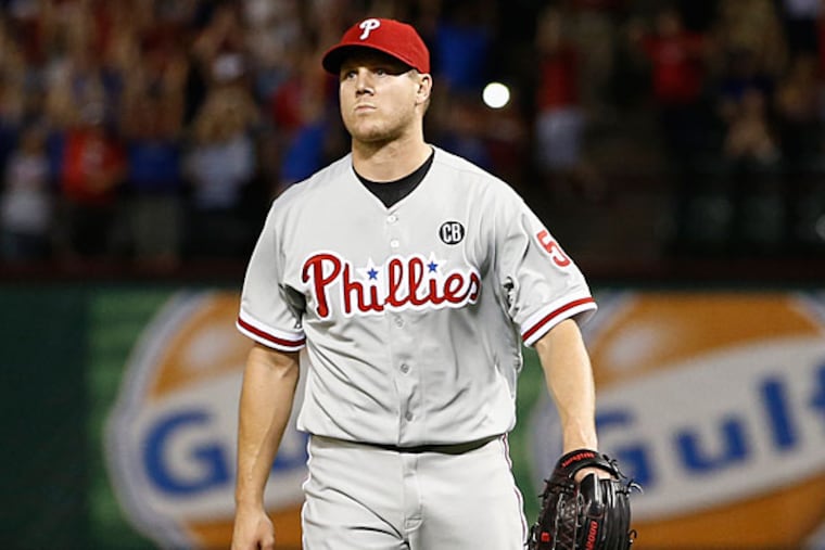 Jonathan Papelbon (58) leaves the field after giving up the game winning walk during the ninth inning of a baseball game against the Texas Rangers, Wednesday, April 2, 2014, in Arlington, Texas. The Rangers won 4-3. (Jim Cowsert/AP)