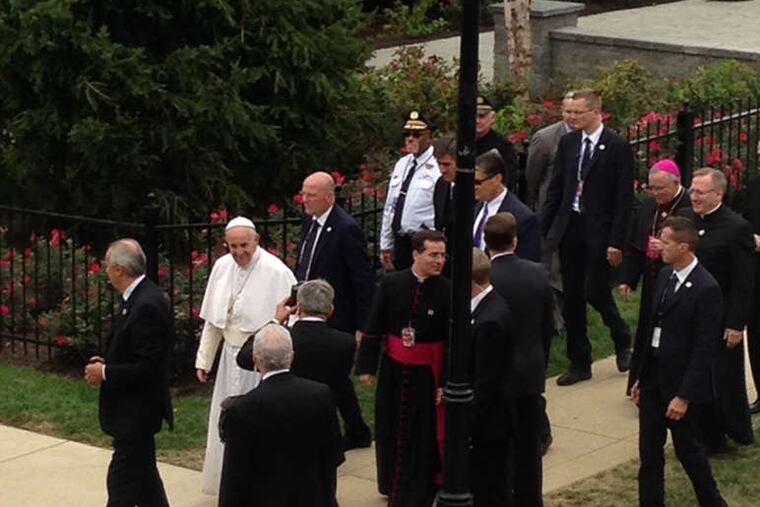 Pope Francis made an unexpected visit Sunday to St. Joseph's University to bless a statue commemorating Catholic-Jewish relations. He arrived to cheers from students, faculty, and staff.