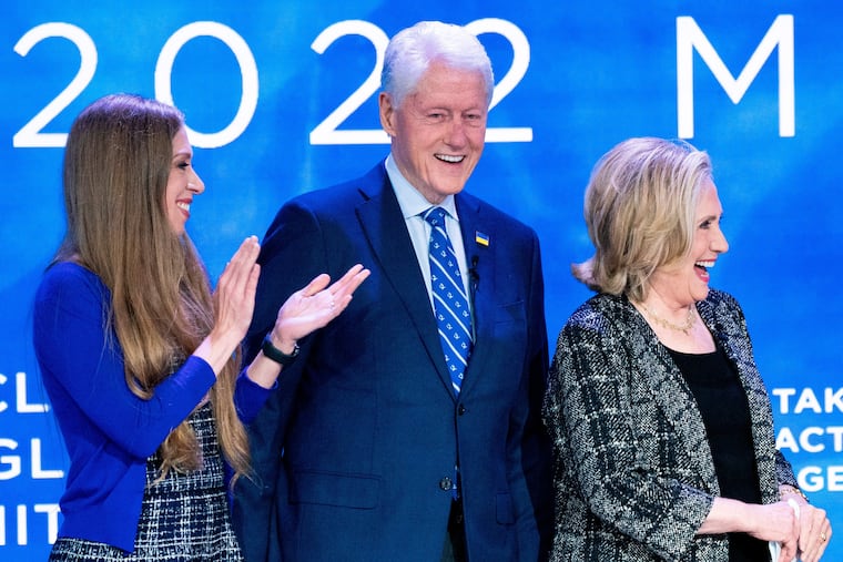 Chelsea Clinton, former President Bill Clinton, and former Secretary f State Hillary Clinton appear at the Clinton Global Initiative on Sept. 20, 2022, in New York.