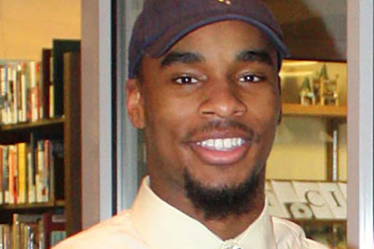 Daryl Worley of Penn Charter poses for a picture after signing his letter of intent to play at West Virginia.