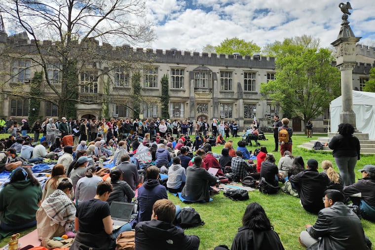 Students on the campus of Princeton University on April 25 after tents set up by protesters were taken down voluntarily. Two graduate students were arrested for trespassing.
