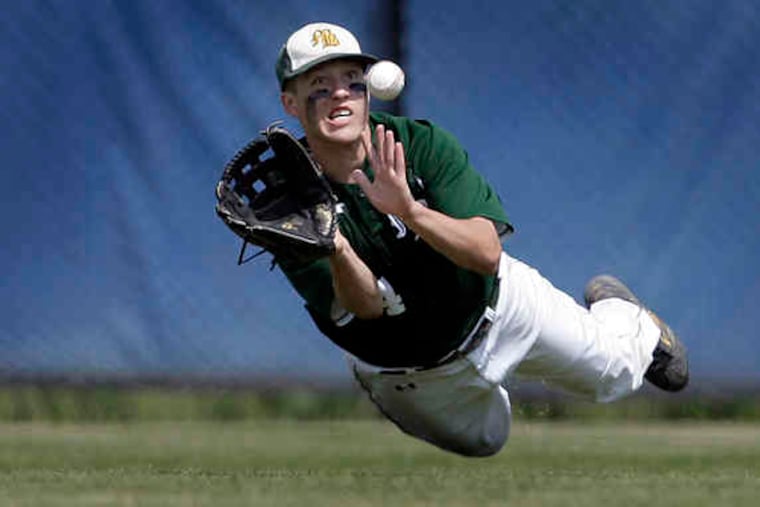 Monsignor Bonner's Rick Reigner makes a diving catch in the District 12 Class AAAA championship game against Central at La Salle High. Reigner contributed a run-scoring triple during a five-run fifth inning for the Friars (20-4).