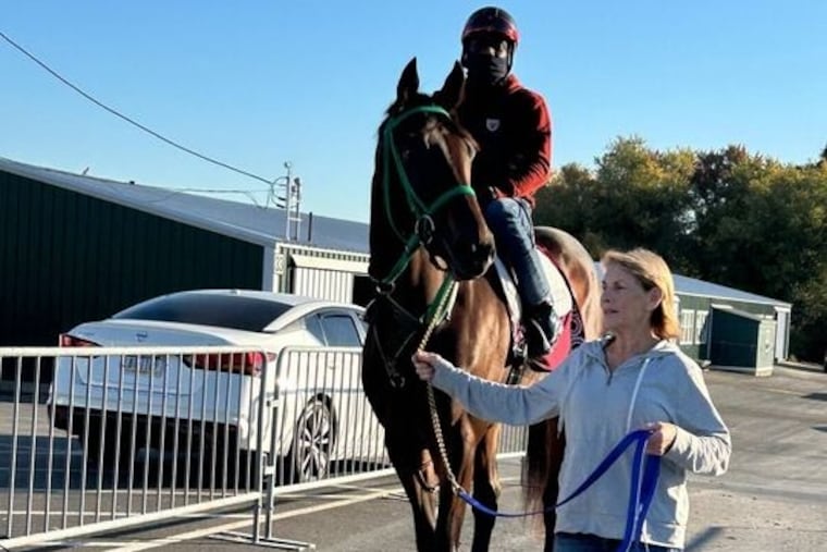 Felissa Dunn with 3-year-old Kentucky Outlaw.