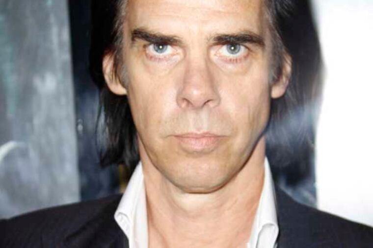 Nick Cave arrives at a central London cinema for the World Premiere of Prometheus, Thursday, May 31, 2012. (AP Photo/Joel Ryan)