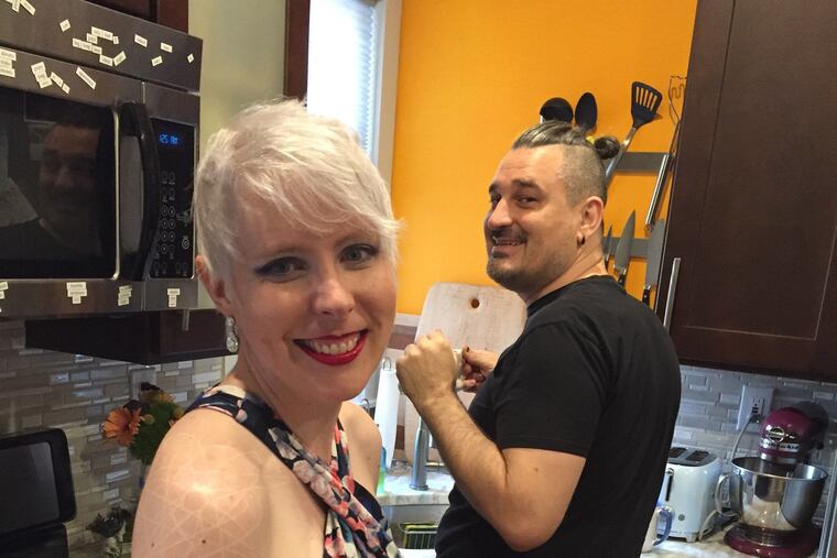 Erin Narewski, a pulmonary and critical care medicine attending physician and assistant professor at Temple, and her husband, Chris.