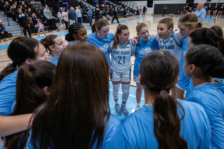 The Holy Family women's basketball team huddles before a game against Molloy in November. The No. 7-seeded Tigers are in the Division II Elite Eight and will face No. 2-seeded Indiana University of Pennsylvania on Tuesday in Pittsburgh.