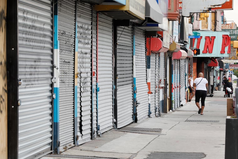 Most businesses on the 2600 block of Germantown Avenue in Philadelphia remain closed on June 19, 2020.