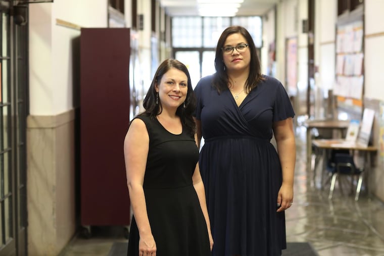 Parent Stephanie Monahon (L) and principal Lauren Overton at Meredith Elementary School.