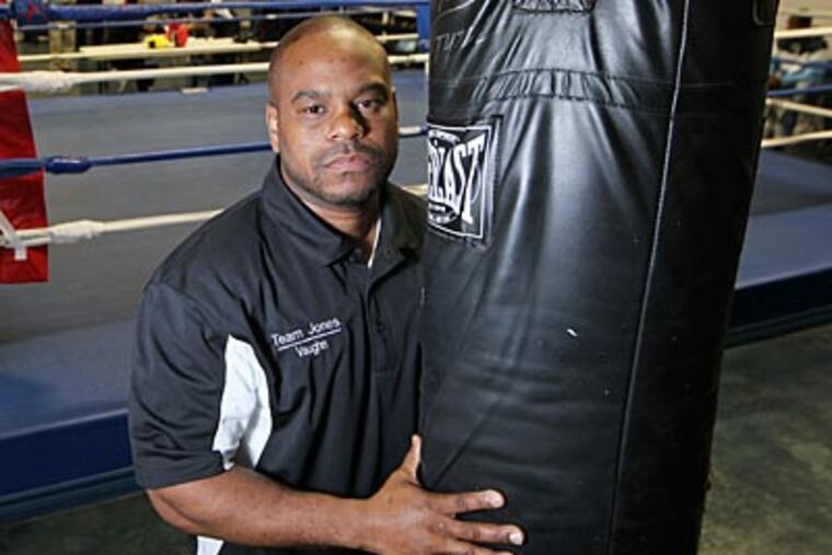 Mike Jones' trainer, Vaughn Jackson, lost his son to an unexplained accident. (Michael Bryant/Staff Photographer)