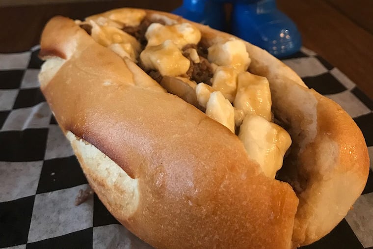 Poutine cheesesteak from Shoo Fry and Pat’s King of Steaks.