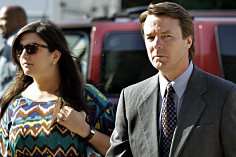 Former Sen. John Edwards arriving at court in Greensboro, N.C., on Monday with his daughter Cate Edwards. CHUCK BURTON / Associated Press