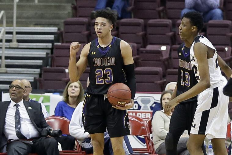 Seth Lundy 23) pumps his first in the final minute of the Cahillites’ 92-80 victory over Lincoln.