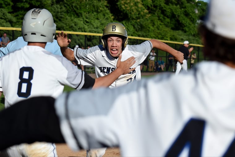 Bensalem's Kyle McLaughlin (24) gets up after sliding safely home for what turned out to be the winning run against La Salle.
