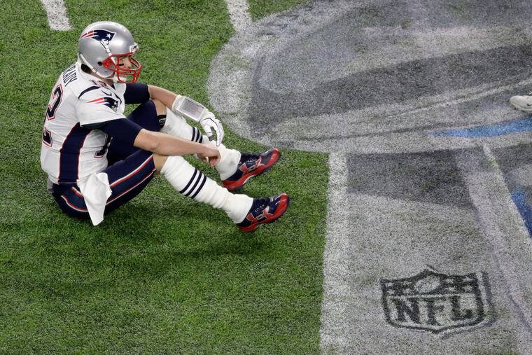 Patriots quarterback Tom Brady sat dejectedly on the field at U.S. Bank Stadium in Minneapolis after his costly fourth-quarter fumble against the Eagles in Super Bowl LII. The Eagles and Patriots will face each other Sunday for the time since that epic game.